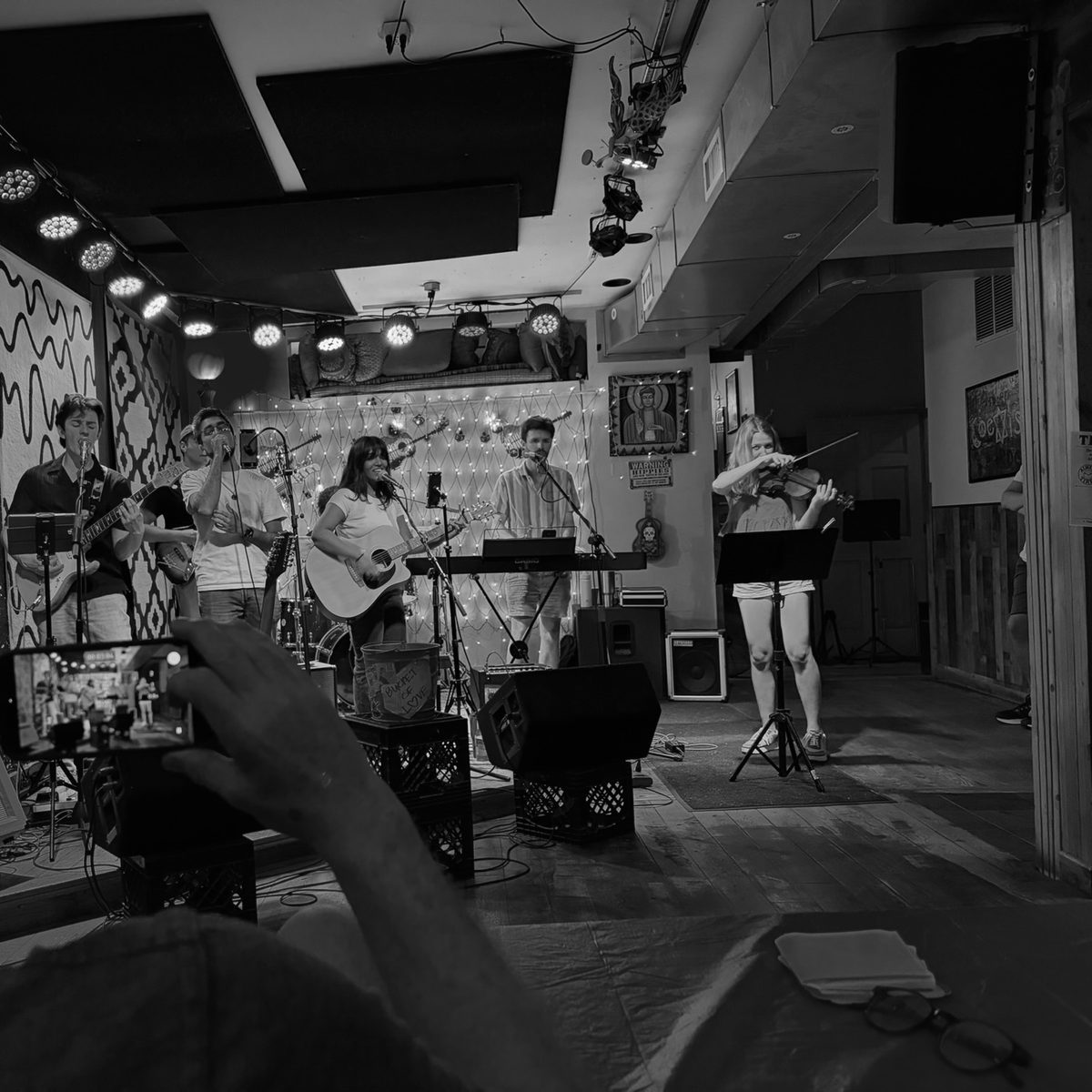 Always Tired on stage at a Minneapolis bar, full seven-piece lineup